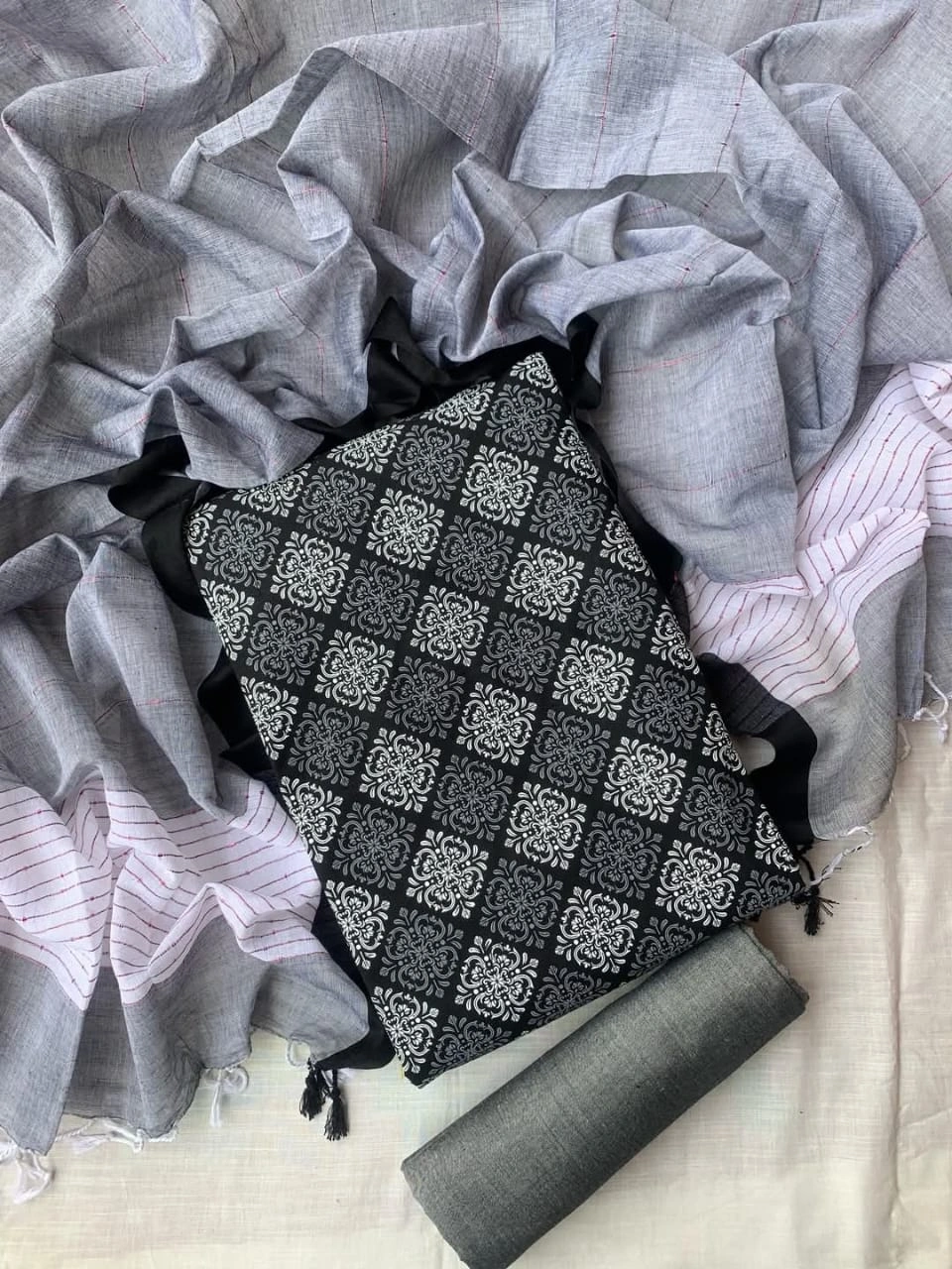 Unstitched Slub cotton three-piece.